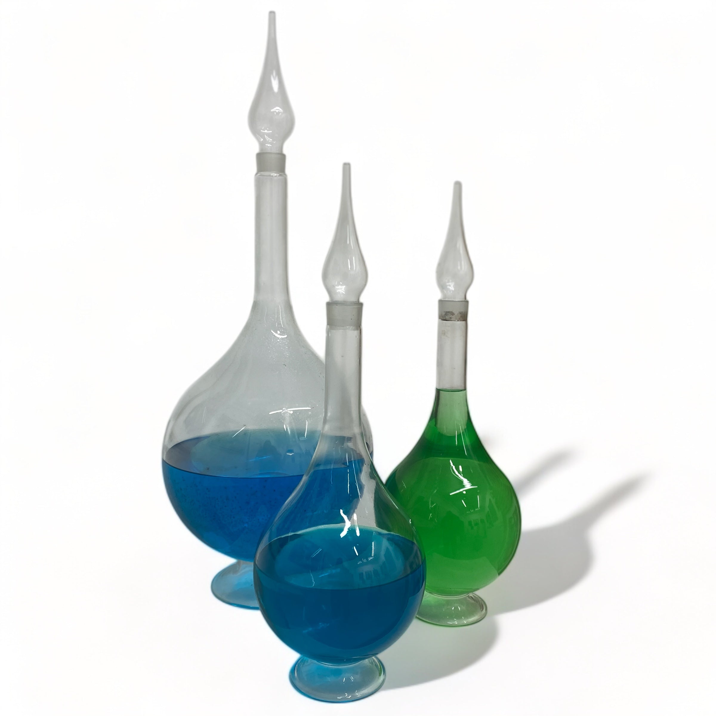 three chemist carboys